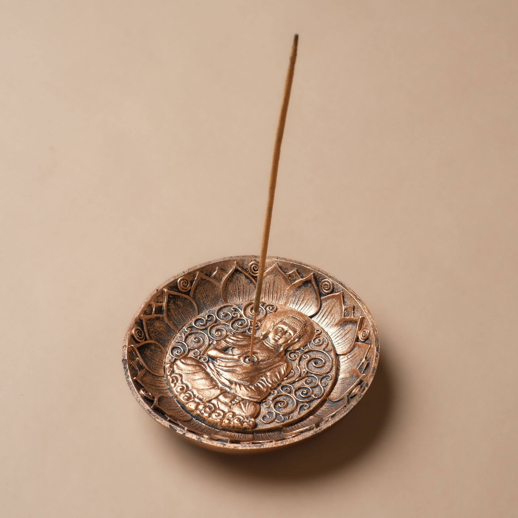 Porte-encens Bouddha rond avec symbole du lotus bronze coloré